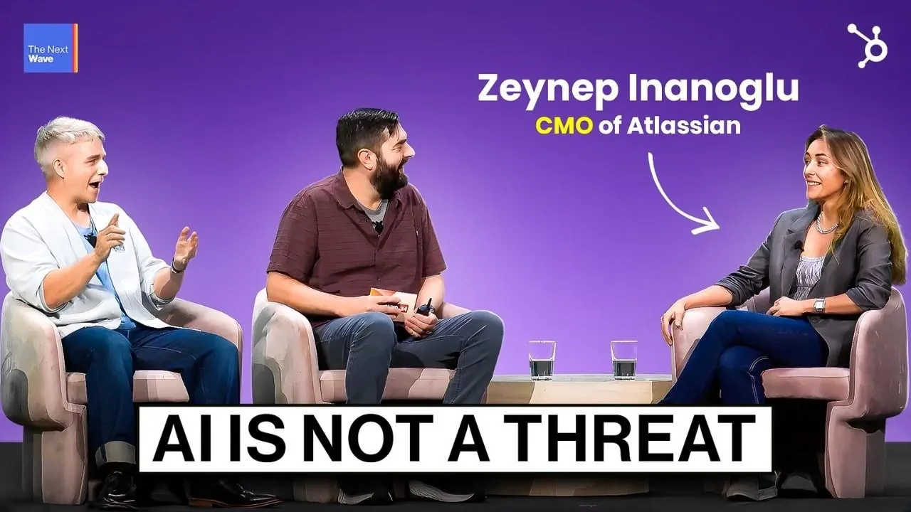 The Next Wave on YouTube: three people in armchairs on a conference stage