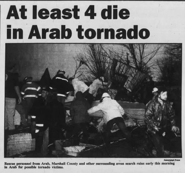Newspaper clipping headlined At least 4 die in Arab tornado, above a photo of rescue workers searching ruins